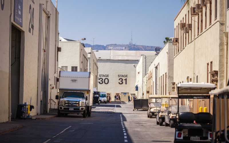 Los Angeles, LA, California, CA, USA, Paramount Pictures - Jul 27, 2018: Paramount Pictures Studio Tour, Stages 30 and 31, with Hollywood sign on the background